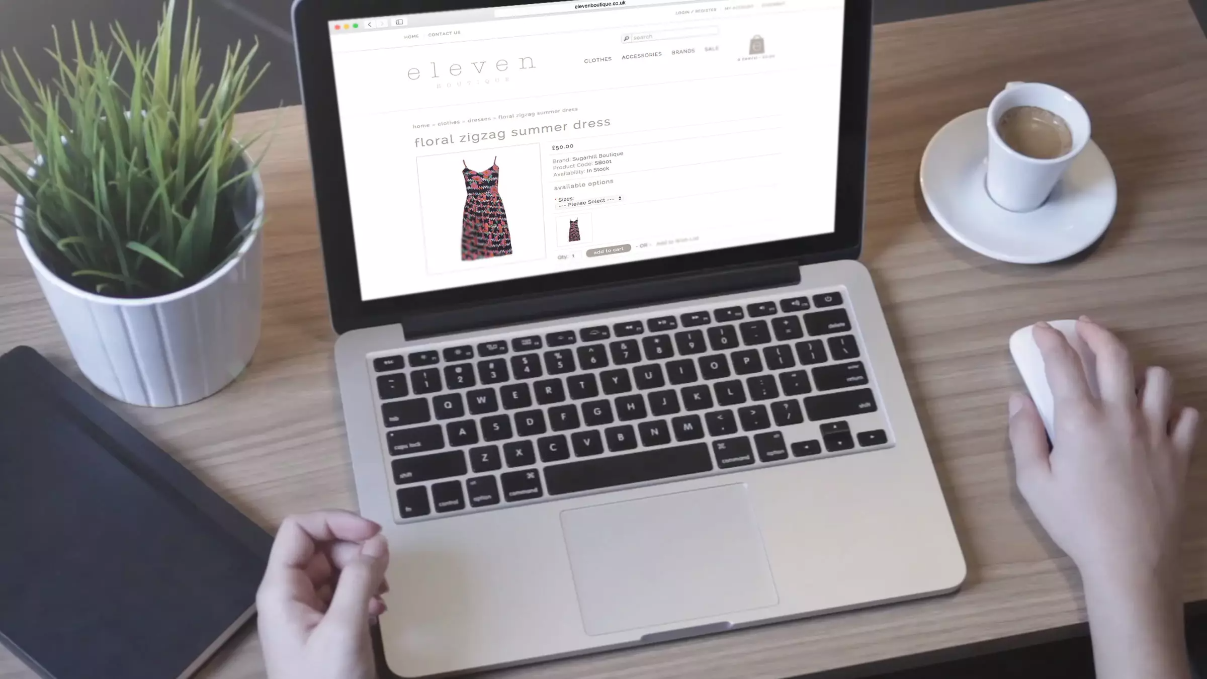 Eleven Boutique website being browsed by person on a laptop