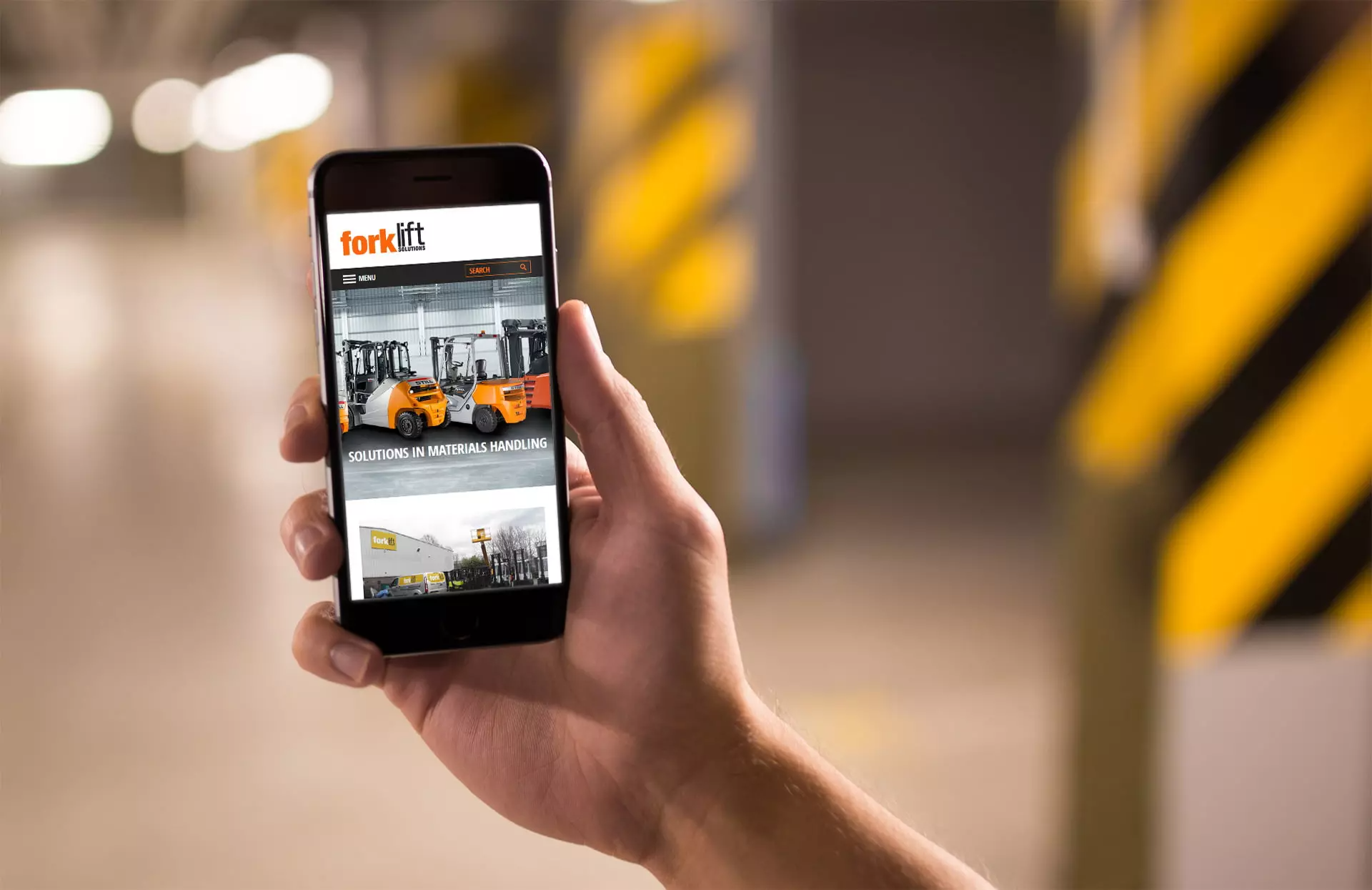 Forklift Solutions website displayed on mobile device