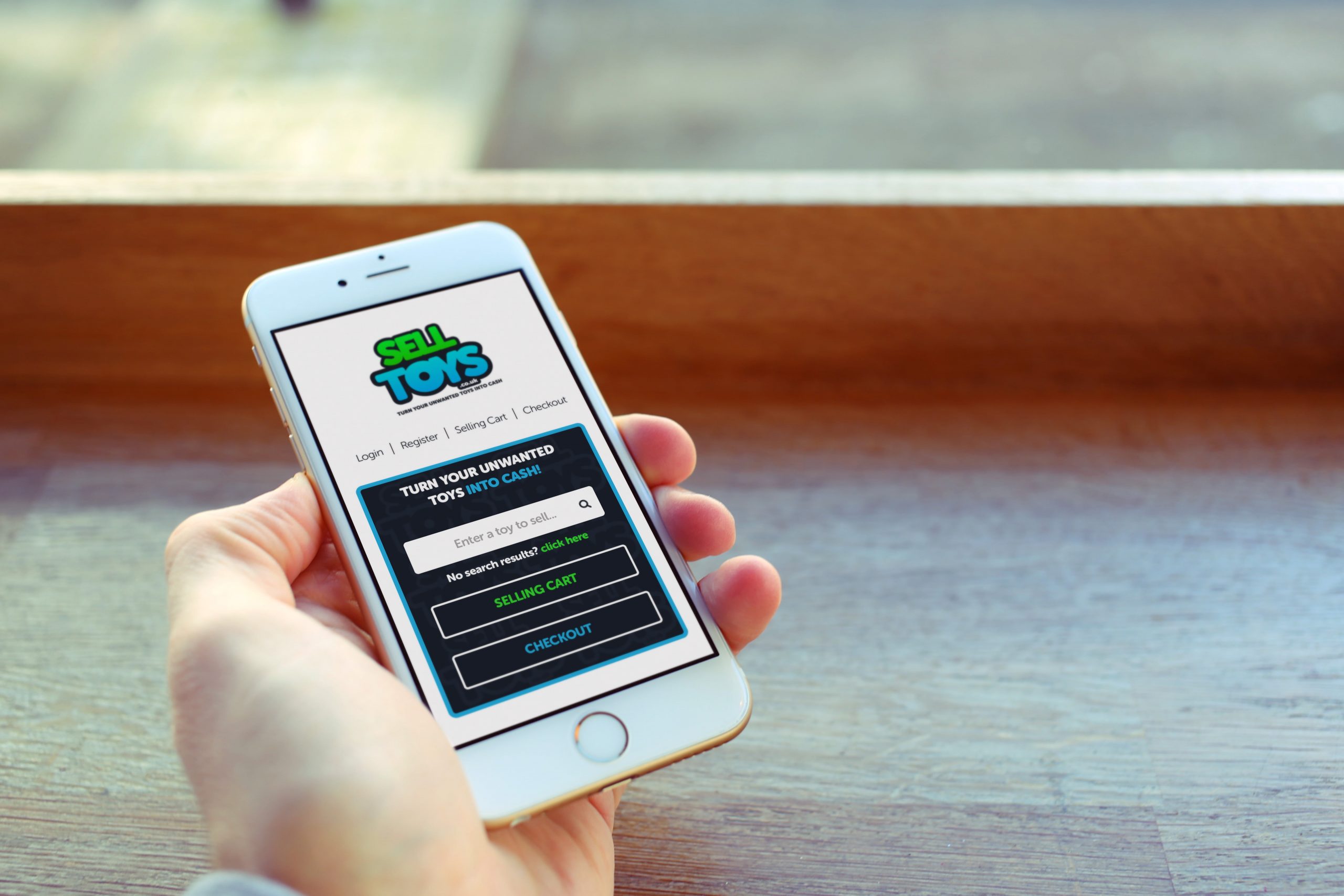 Sell Toys website being viewed by person on mobile