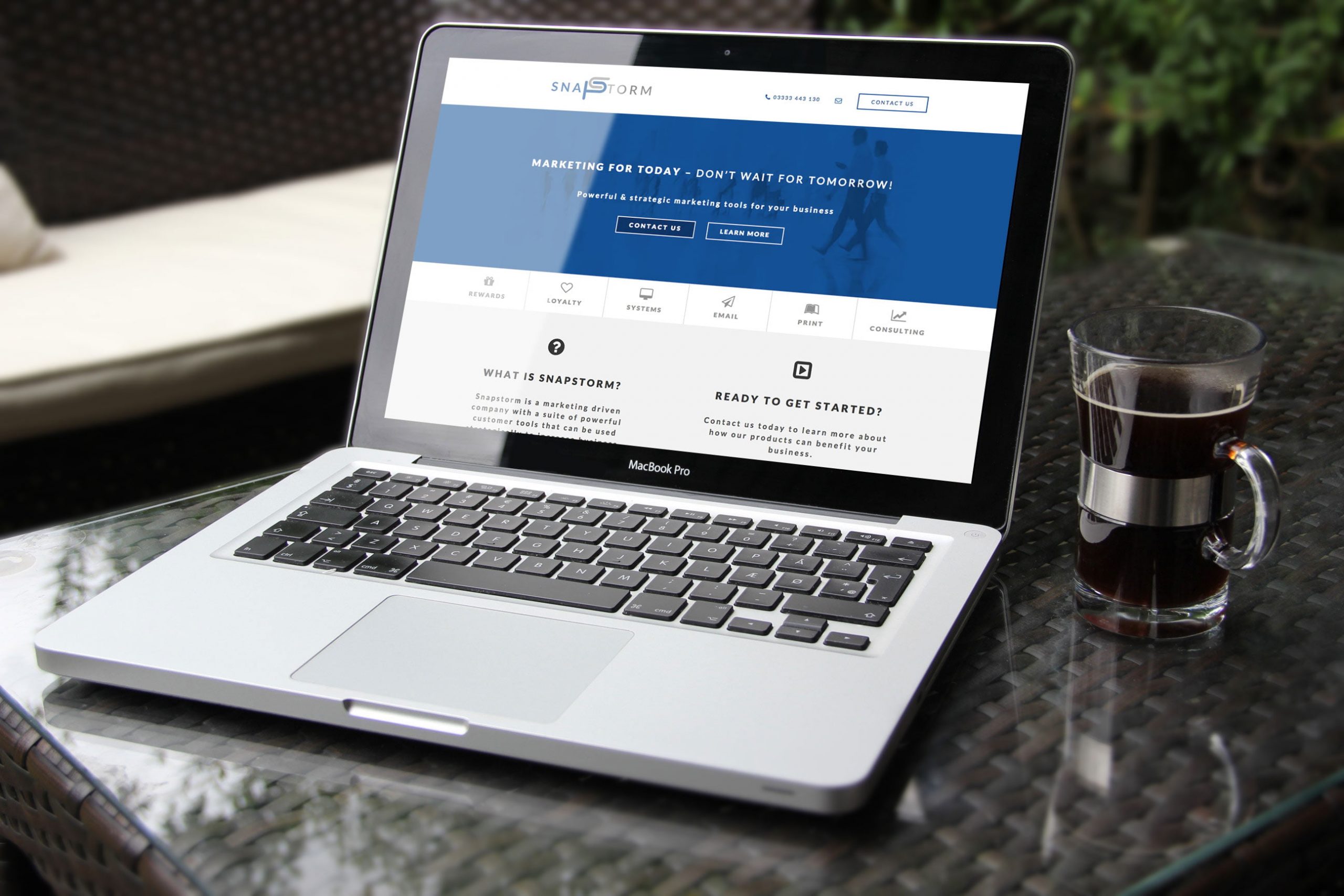 Snapstorm website displayed on laptop